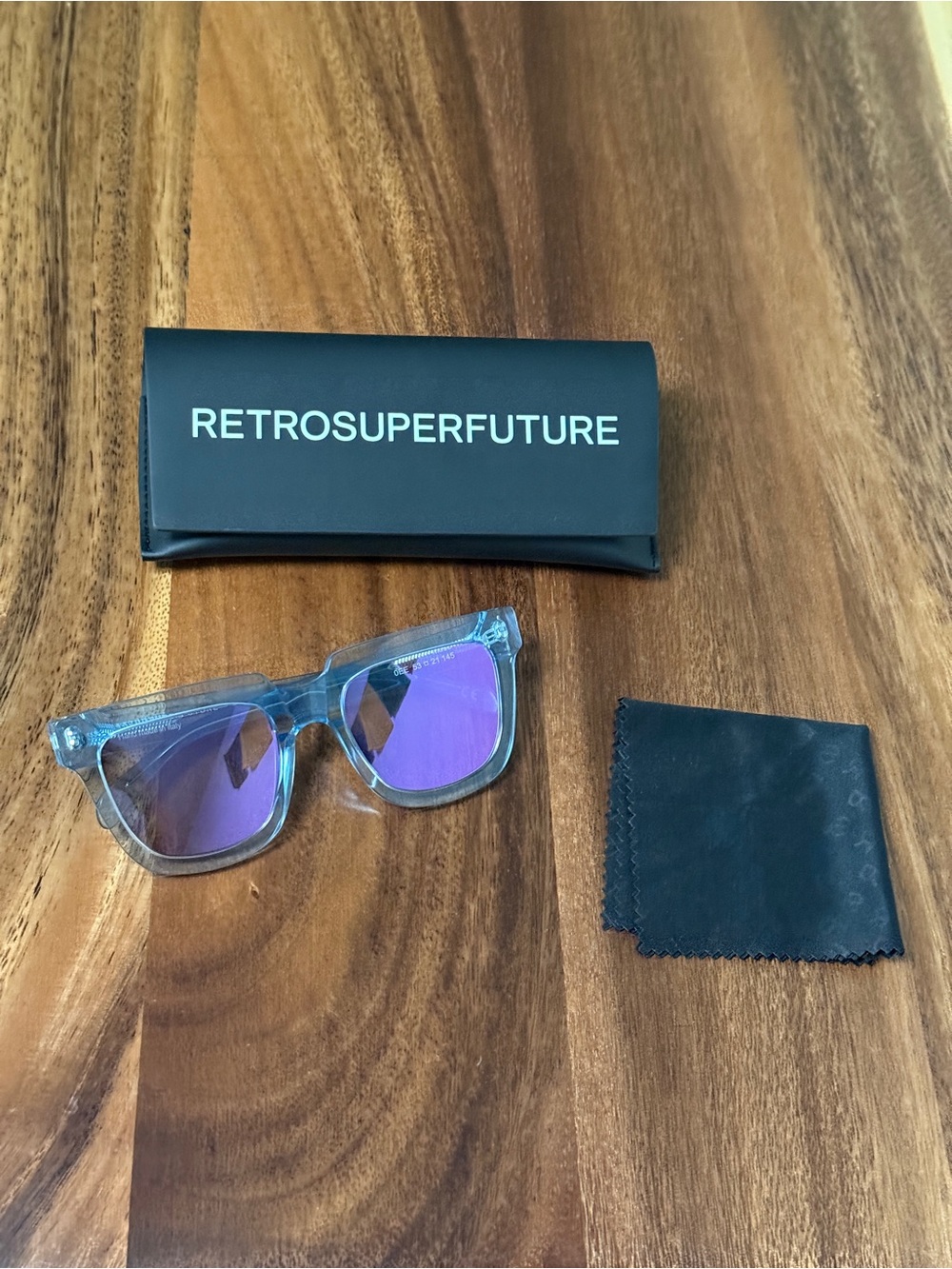 RetroSuperFuture Turquoise Frame Sunglasses with Purple Lenses